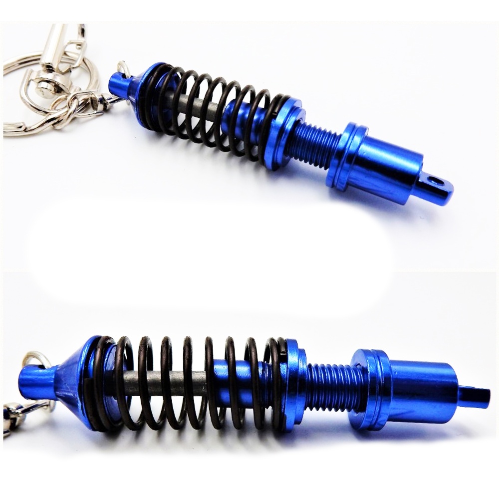 Llavero Coche Movimiento real Resorte de Amortiguador Azul en metal IDEA REGALO Llavero Coche Movimiento real Resorte de Amortiguador Azul en metal IDEA REGALO